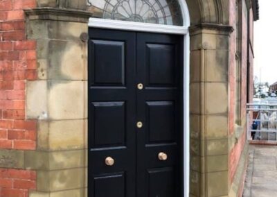 Refurbished doors for the former Lloyds Bank in Buckley